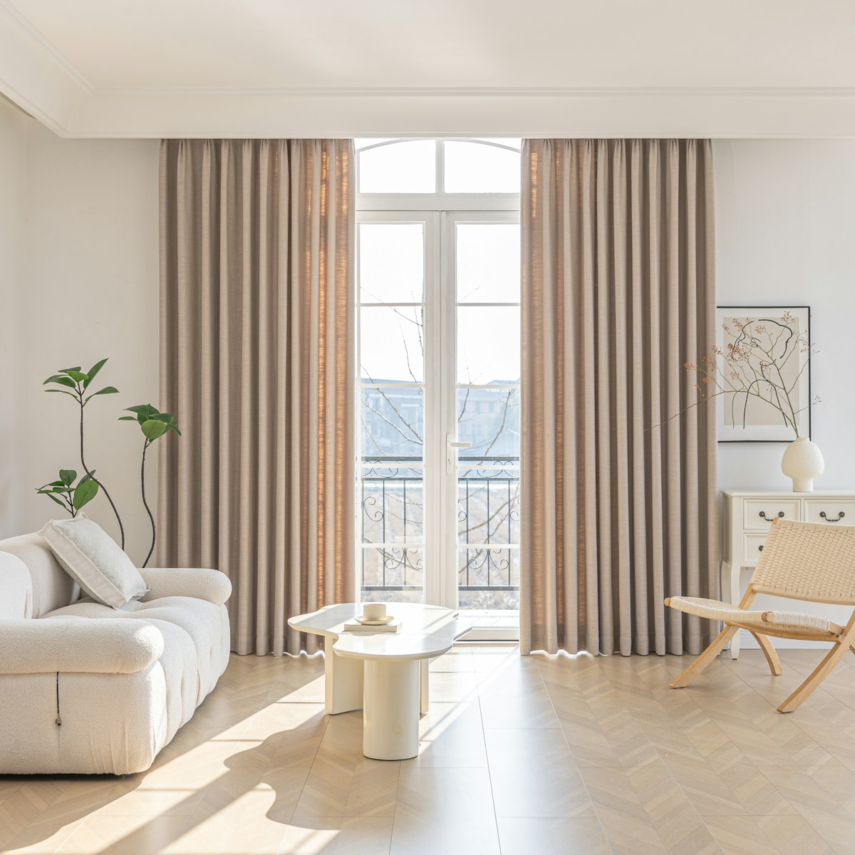 Bright living room with a low coffee table and beige curtains